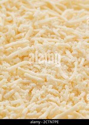 Rasierte Parmesan-Käse Hintergrund Stockfoto