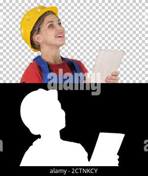 Bauingenieurin mit einem Tablet-Computer bei einer Konstruktion Stockfoto