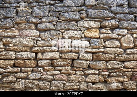 Teil einer Stein Licht antiken Wand, Hintergrund und Textur. Stockfoto