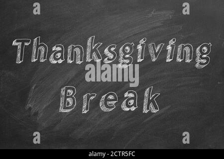 Handzeichnung Text 'Thanksgiving Break' auf Tafel Stockfoto