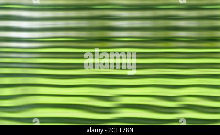 Welliger grüner Hintergrund Stockfoto