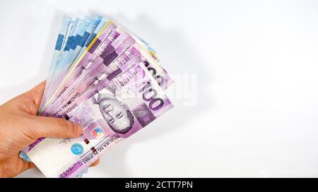 Philippine Peso Rechnungen auf weißem Hintergrund Stockfoto