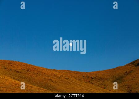 USA, Idaho, Sun Valley, aufgehender Mond über Berg Stockfoto