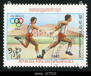 KAMBODSCHA - UM 1983: Briefmarke gedruckt von Kambodscha, zeigt Läufer, um 1983. Stockfoto