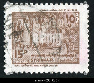 SYRIEN - UM 1978: Briefmarke gedruckt von Syrien, zeigt Wandbild aus dem Nationalmuseum, um 1978 Stockfoto