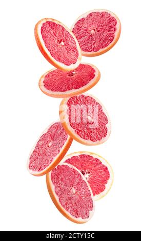 Fallende Grapefruitscheiben isoliert auf weißem Hintergrund. Stockfoto