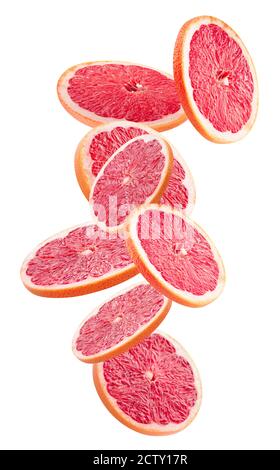 Fallende Grapefruitscheiben isoliert auf weißem Hintergrund. Stockfoto