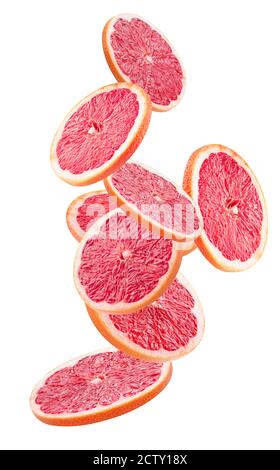 Fallende Grapefruitscheiben isoliert auf weißem Hintergrund. Stockfoto