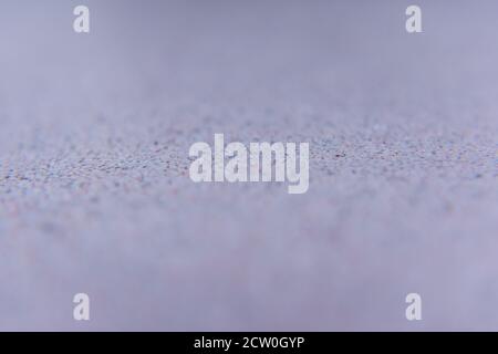 Grobe Kunststoff-Textur Hintergrund Nahaufnahme mit selektivem Fokus. Rosa Struktur. Stockfoto