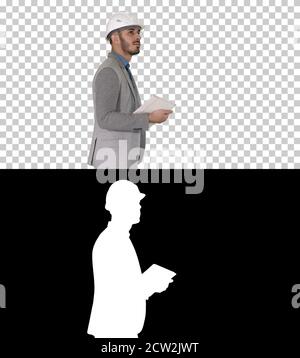 Architekt Gehen mit Tablet und überprüfen, was gebaut wird, Alpha Stockfoto