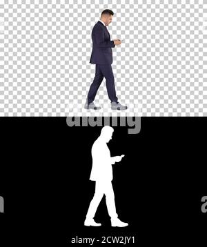 Reicher Mann zählt das Geld zu Fuß, Alpha Channel Stockfoto
