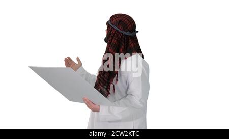 Sheikh Blick auf Blaupause und auf das Objekt auf weiß backgroun Stockfoto