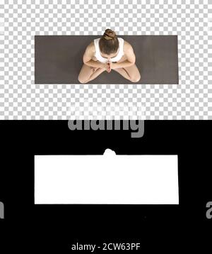 Junge Yogi Frau praktiziert Yoga, macht Namaste Geste in lotu Stockfoto