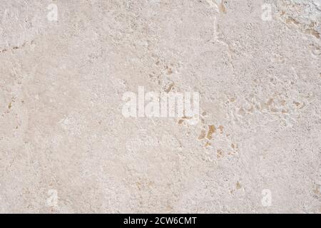 Beige Marmor Kalkstein ähnlich der natürlichen Oberfläche für Bad oder Küche Arbeitsplatte. Hochauflösende Texturen und Muster. Stockfoto