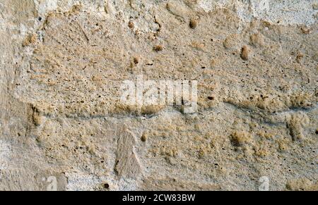 Textur einer Steinwand. Alte Burg Stein Wand Textur Hintergrund. Steinmauer als Hintergrund oder Textur. Teil einer Steinmauer für Hintergrund oder Text Stockfoto