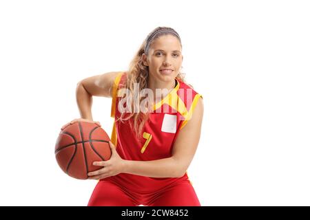 Basketballspielerin in einem roten Trikot isoliert auf Weiß Hintergrund Stockfoto