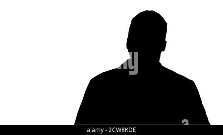 Silhouette Male African Doctor Stehend Mit Händen In Seiner Tasche Stockfoto