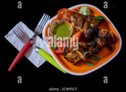 Gegrilltes oder Tandoori Huhn scharf Stockfoto