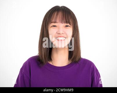 Junge glücklich Teenager Mädchen Blick auf Kamera Stockfoto