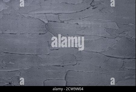 Dunkelschwarzer Beton Wand Textur Hintergrund. Natürliche schwarze Schiefer Beton Hintergrund Muster. Stockfoto