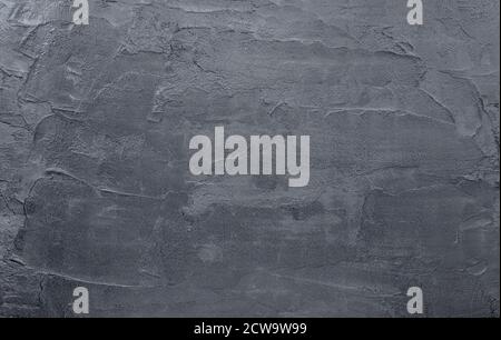 Dunkelschwarzer Beton Wand Textur Hintergrund. Natürliche schwarze Schiefer Beton Hintergrund Muster. Stockfoto