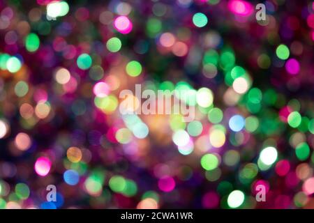 Festliche bunte Bokeh Hintergrund mit psychedelischen bunten funkelt und bunte Punkte als perfekten Hintergrund für silvester, Feier frohes neues Jahr Stockfoto