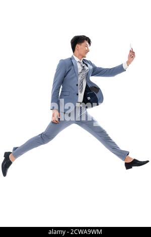 Holen Sie sich das Telefon laufen springen ein Geschäftsmann Stockfoto