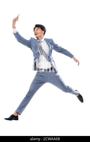 Holen Sie sich das Telefon laufen springen ein Geschäftsmann Stockfoto