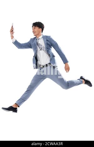 Holen Sie sich das Telefon laufen springen ein Geschäftsmann Stockfoto