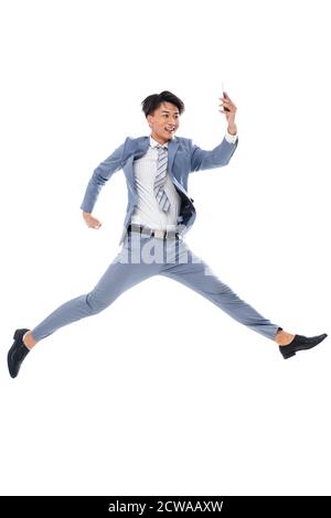 Holen Sie sich das Telefon laufen springen ein Geschäftsmann Stockfoto
