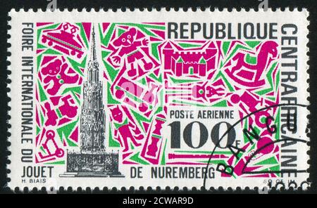 ZENTRALAFRIKANISCHE REPUBLIK 1969: Briefmarke gedruckt von Zentralafrikanische Republik, zeigt Marktkreuz, Nürnberg, und Spielzeug, um 1969 Stockfoto