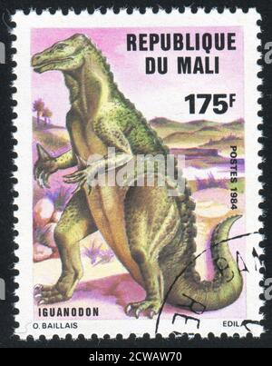 MALI - UM 1984: Briefmarke gedruckt von Mali, zeigt Iguanodon, um 1984 Stockfoto