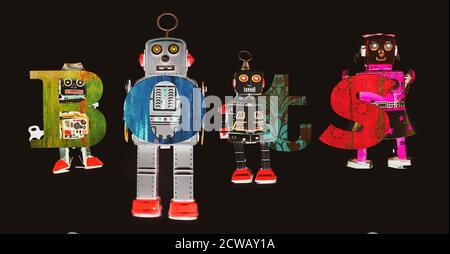 Retro Zinn Roboter Spielzeug halten die Wort BOTS isoliert Auf Schwarz Stockfoto