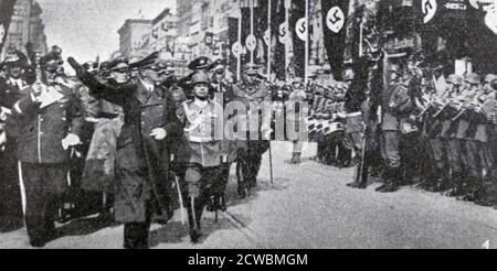 Schwarz-Weiß-Foto zur Münchner Konferenz von 1938, das Führer der vier teilnehmenden Nationen zeigt, die aus München zurückkehren; Hitler kehrt nach Berlin zurück. Stockfoto