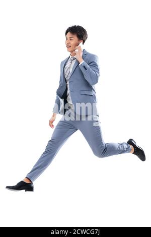 Holen Sie sich das Telefon laufen springen ein Geschäftsmann Stockfoto