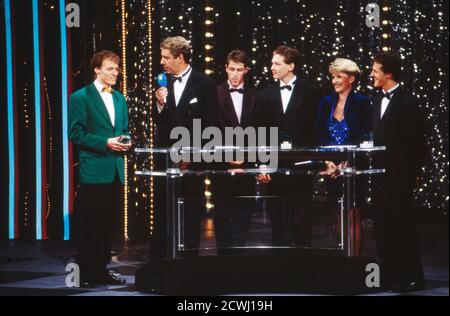 ARD Sportgala 1992, Abendveranstaltung am 13. Dezember 1992, mit dabei: Dieter Baumann, Moderator Gerhard Meier-Röhn, Marco Dauser, Carmen Nebel, Michael Schumacher Stockfoto