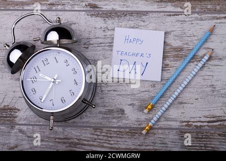 Zusammensetzung der Schulsachen für glücklichen Tag des Lehrers. Stockfoto