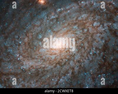 Das Hubble Weltraumteleskop erfasst ein Bild von NGC 4237, einer flockenden Spiralgalaxie, die sich 60 Millionen Lichtjahre entfernt im Sternbild Coma Berenices befindet. Die Spiralarme sind flauschig und diskontinuierlich, was ihm ein flauschiges, baumwollähnliches Aussehen verleiht. Astronomen untersuchen seine galaktische Struktur und Sternentstehung. Stockfoto