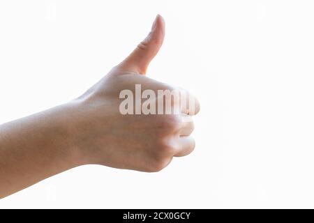 Junge Frauen Hand zeigt Daumen nach oben Zeichen, wie, isoliert auf weißem Hintergrund. Stockfoto