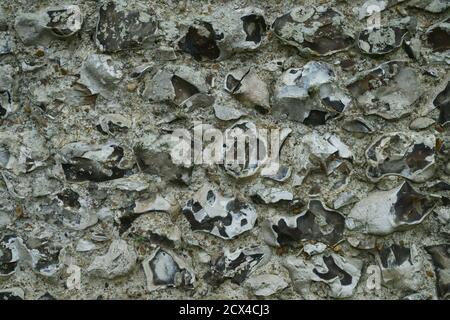 Eine Nahaufnahme von Hamsey Kirche Feuerstein Wand East Sussex UK. Stockfoto