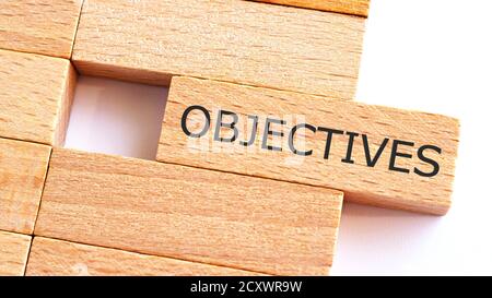 Ziele auf Holzklötze geschrieben. Geschäftskonzept.EIN Stück Holz mit TEXTZIELEN. Stockfoto
