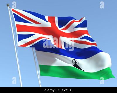 Zwei wehende Staatsflaggen von Großbritannien und Lesotho am blauen Himmel. Hochwertiger Geschäftshintergrund. 3d-Illustration Stockfoto