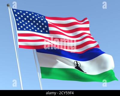 Zwei wehende Staatsflaggen von USA und Lesotho am blauen Himmel. Hochwertiger Geschäftshintergrund. 3d-Illustration Stockfoto