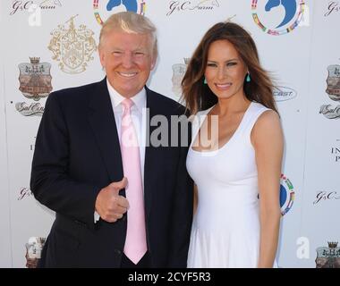 PALM BEACH, FL - JANUAR 06: Melania Trump, Barron Trump und Donald Trump nehmen am 6. Januar 2013 am Trump Invitational Grand Prix 2013 im Club Mar-a-Lago in Palm Beach, Florida Teil. Personen: Melania Trump, Donald Trump Kredit: Storms Media Group/Alamy Live News Stockfoto