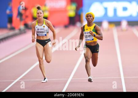 Shelly-Ann Fraser-Pryce (Jamaika), Gina Lückenkemper (Deutschland). 100 Meter, Runde 1. IAAF Leichtathletik-Weltmeisterschaften, Doha 2019 Stockfoto