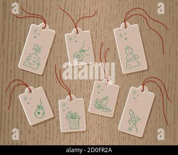 Set von Weihnachtspapier-Tags auf Schnur. Mit handgezeichneten Weihnachtsobjekten, in grünen Farben. Stock Vektor
