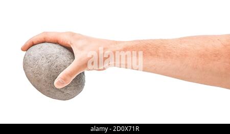 Hand hält Steinkugel. Stück Stein isoliert auf weiß Stockfoto