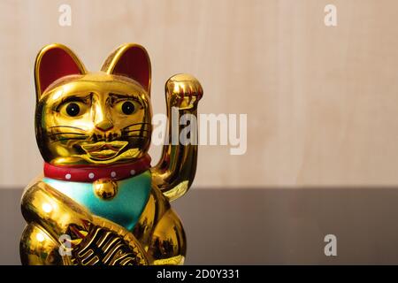 Maneki Neko Katze Nahaufnahme, japan Glücksbringer Stockfoto