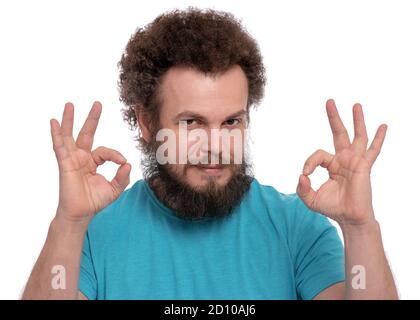 Verrückte bärtige Mann Emotionen und Zeichen Stockfoto