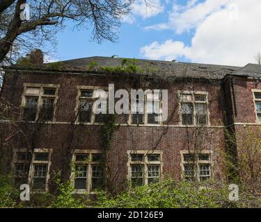 Die Haunted Pennhurst School- die auch als Pennhurst Asylum bekannt ist, wegen seiner beklagenswerten, unterbesetzt, & überfüllten Bedingungen Stockfoto